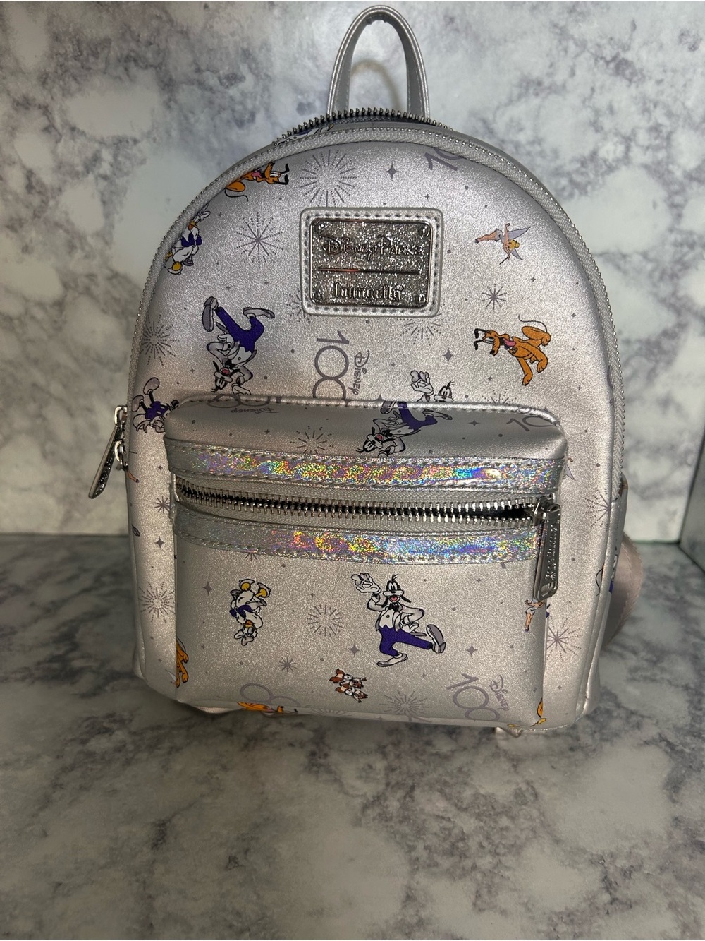 Disney 100th Anniversary Loungefly Holographic Backpack with holographic print